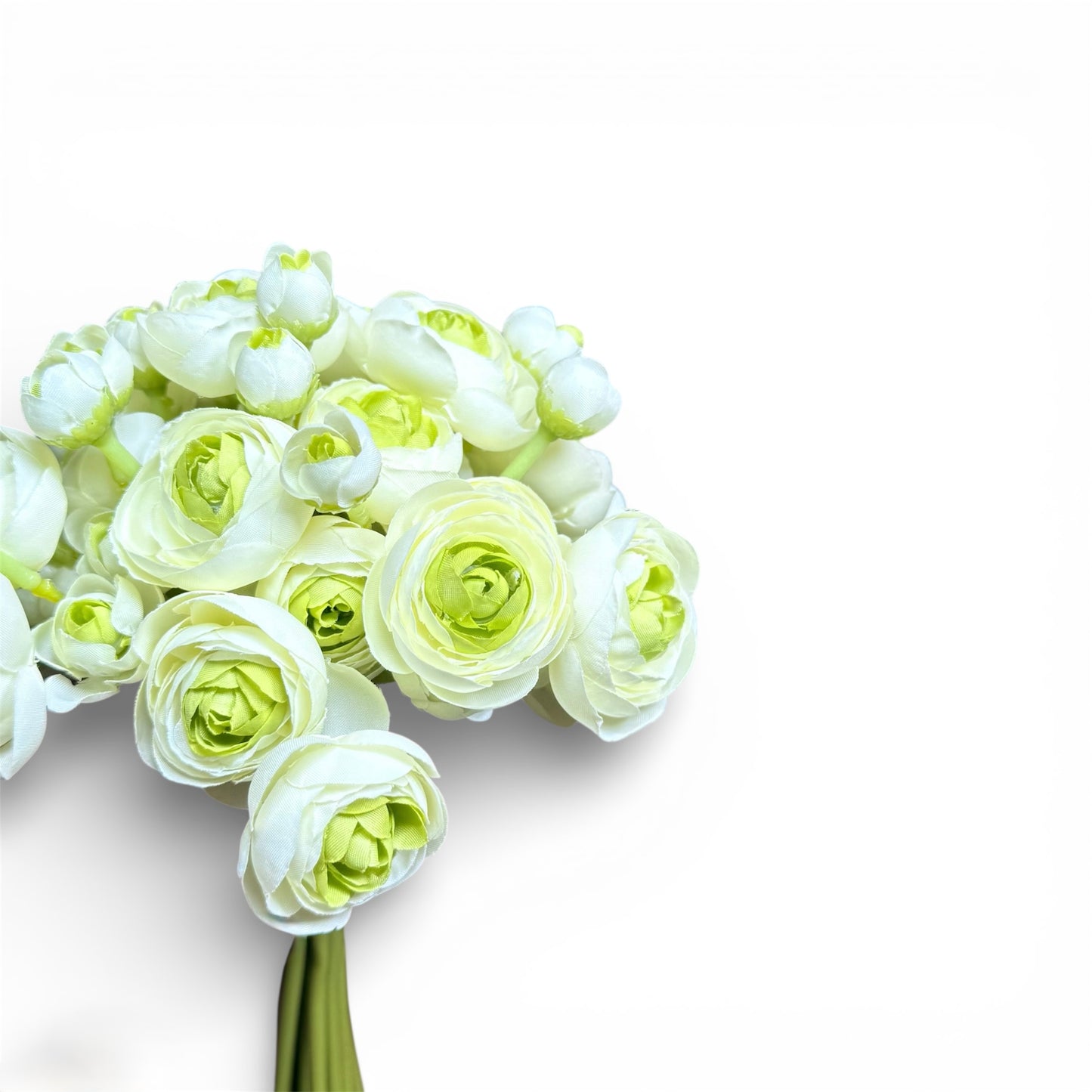 Bouquet of white and light green artificial flowers on a white background