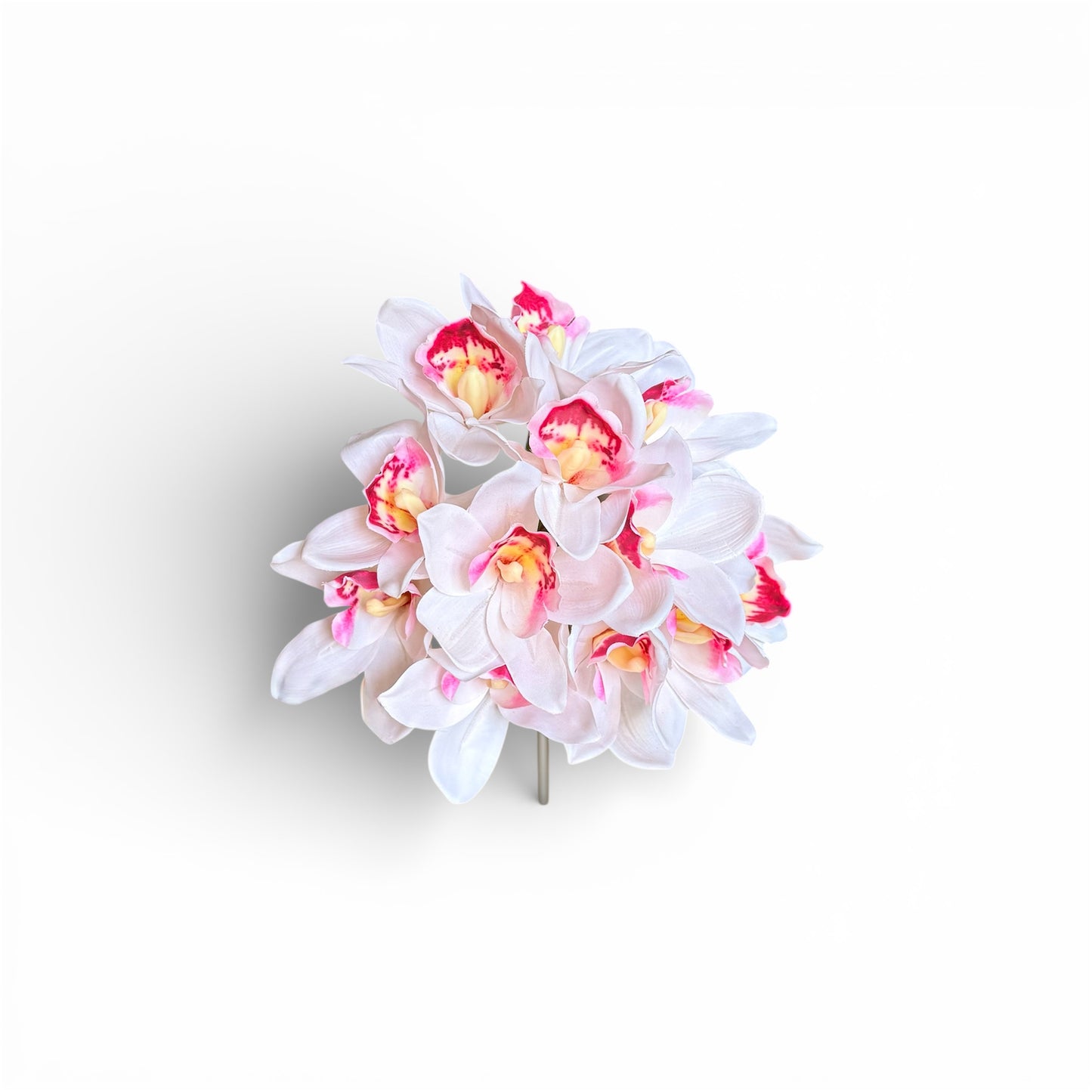 Floral arrangement with white and pink flowers on a white background
