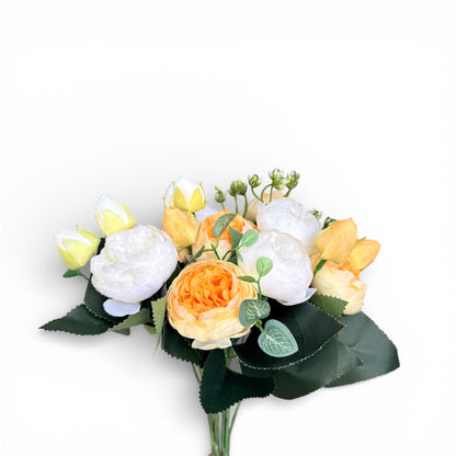 Bouquet of artificial flowers with yellow and white roses on a white background